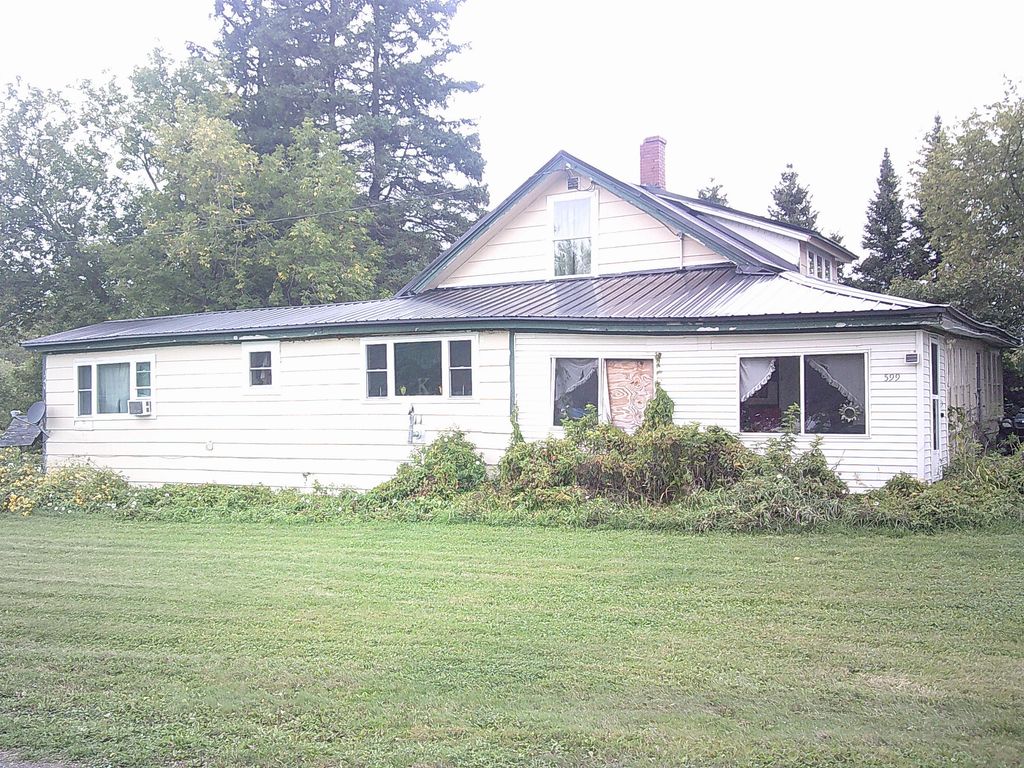 Photo of 599 Access Highway, Limestone, ME 04750 (MLS # 1636740)