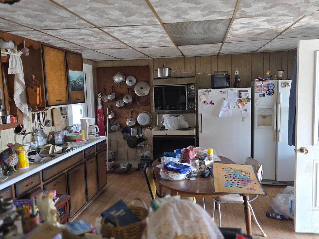 Photo of 69 Cleaves Street, Island Falls, ME 04747 (MLS # 1660917)