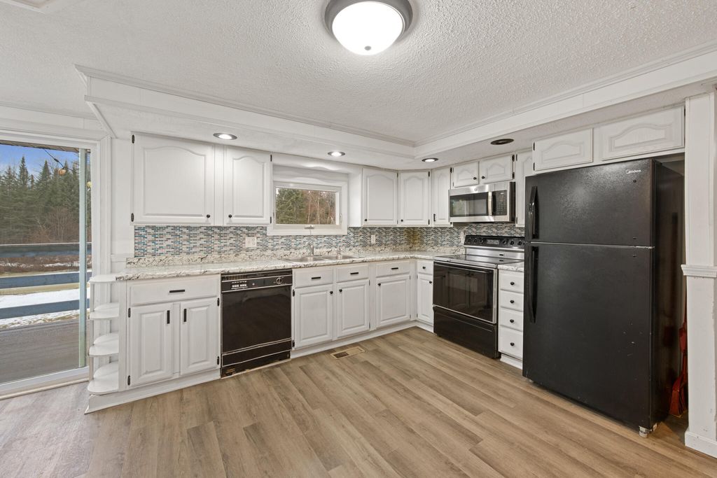 Photo of 145 River Road, Milo, ME 04463 (MLS # 1654073)