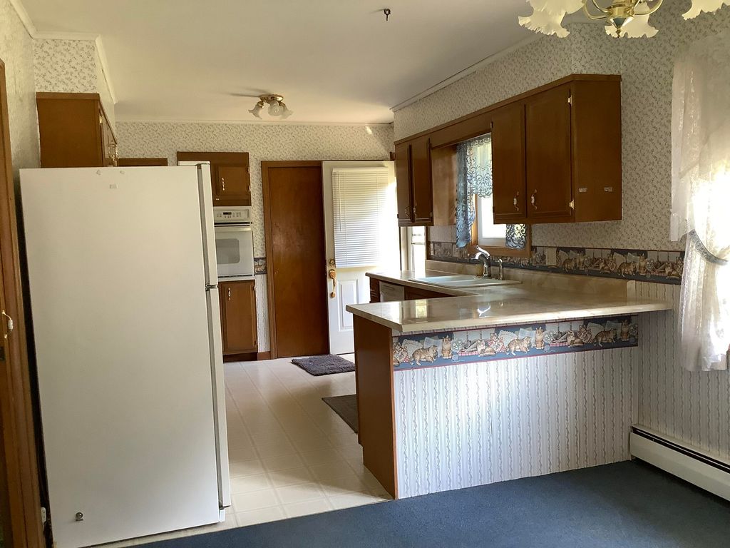 Photo of 91 Hanson Lake Road, Mapleton, ME 04757 (MLS # 1639564)