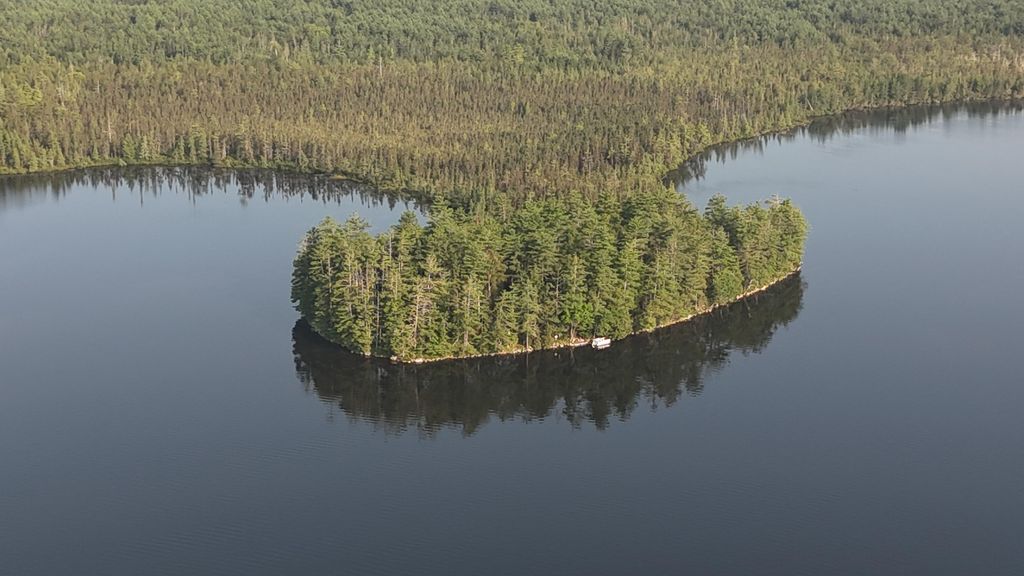 Photo of 735 Mountain Road, Seboeis Plt, ME 04448 (MLS # 1654110)