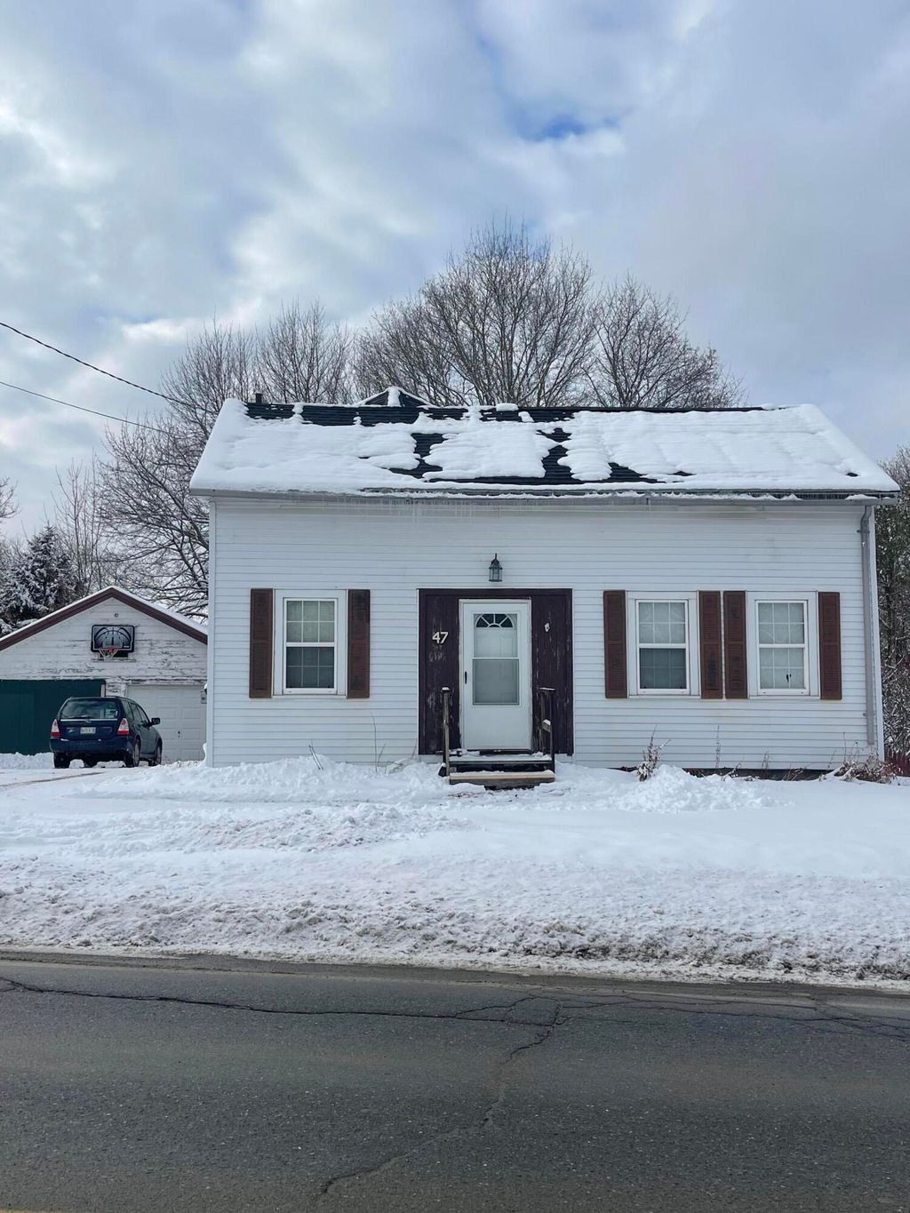 Photo of 47 Enfield Road, Lincoln, ME 04457 (MLS # 1649742)