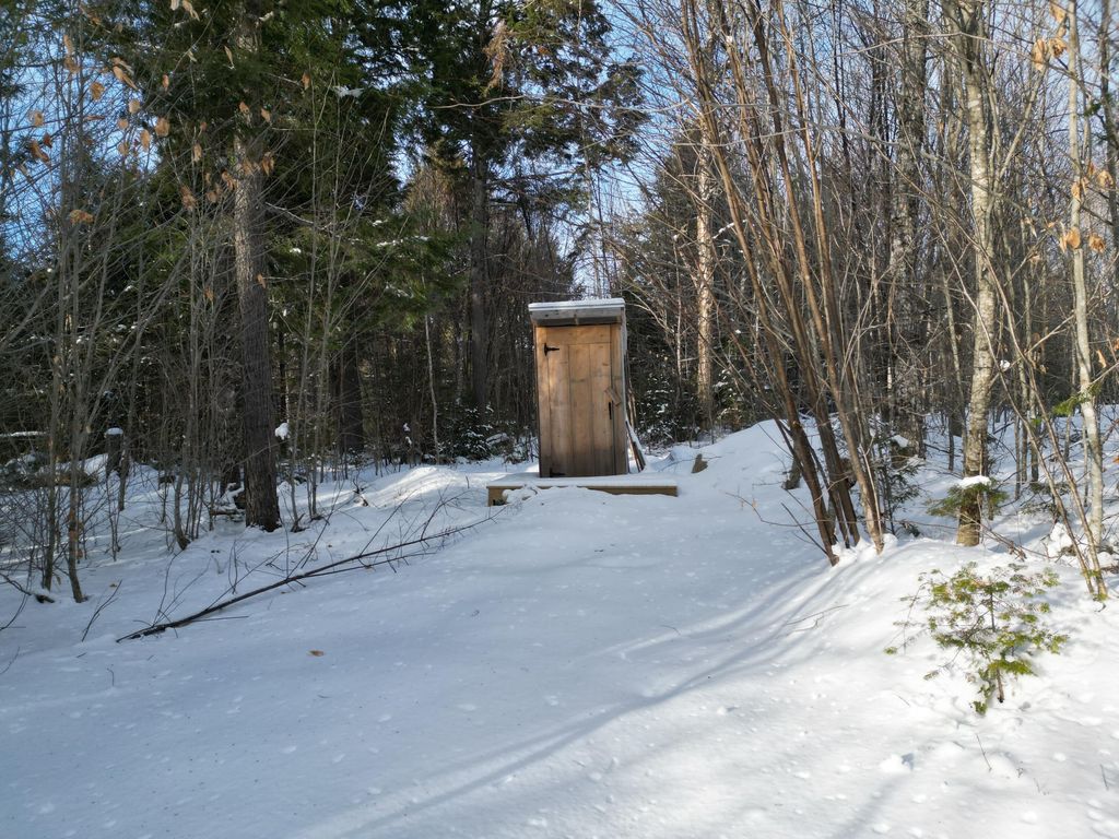 Photo of 16 Crooked Pond Road, Lincoln, ME 04457 (MLS # 1650260)