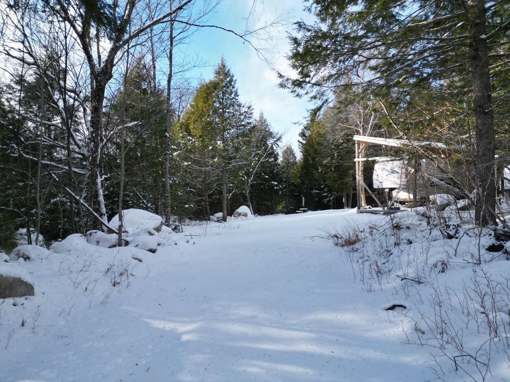 Photo of 16 Crooked Pond Road, Lincoln, ME 04457 (MLS # 1650260)