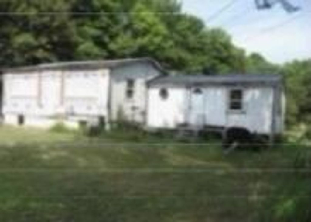 Photo of 401 Canaan Road, Pittsfield, ME 04967 (MLS # 1656919)