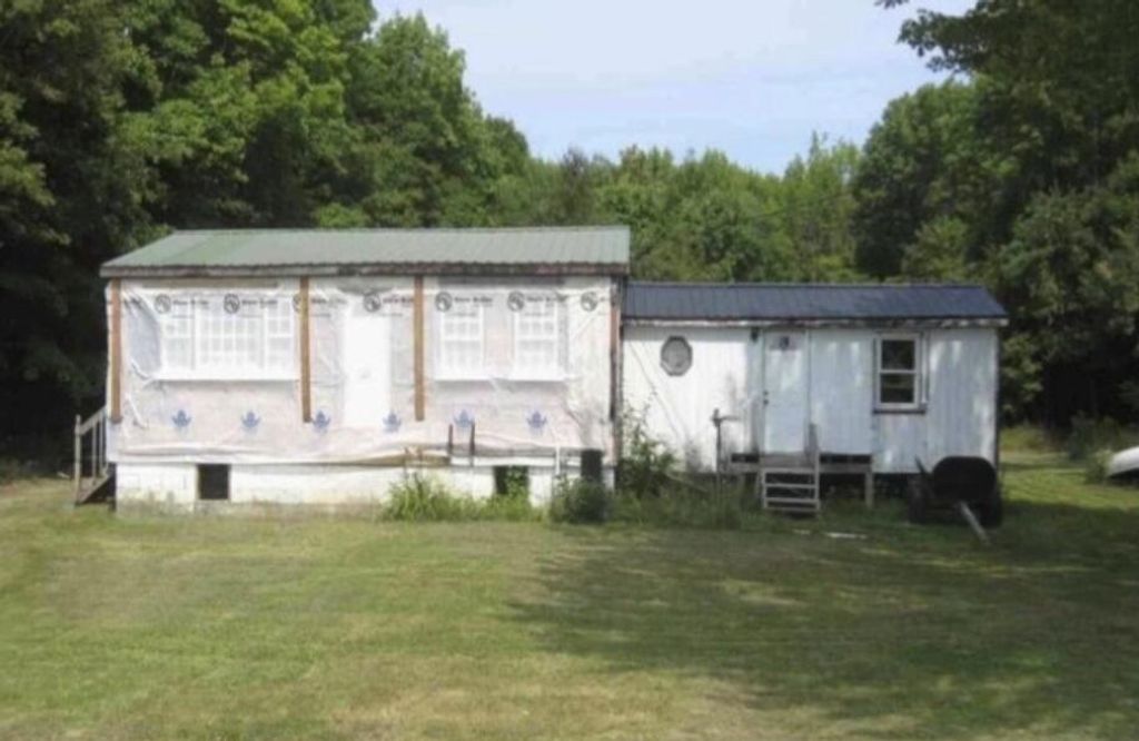 Photo of 401 Canaan Road, Pittsfield, ME 04967 (MLS # 1656919)