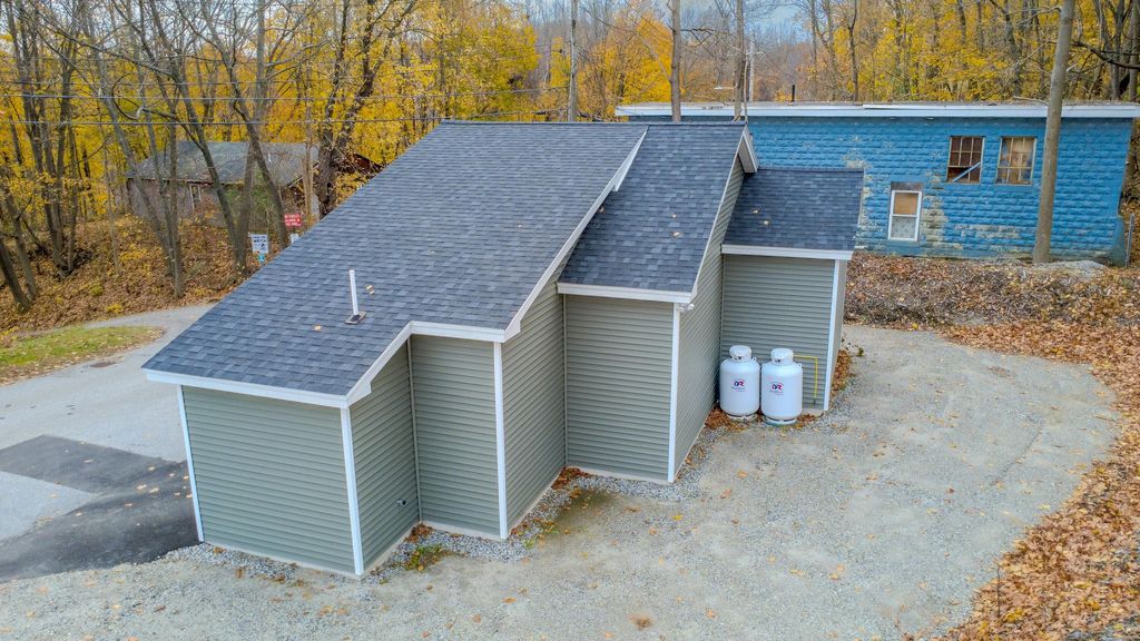 Photo of 9 Hutchins Street, Auburn, ME 04210 (MLS # 1643486)