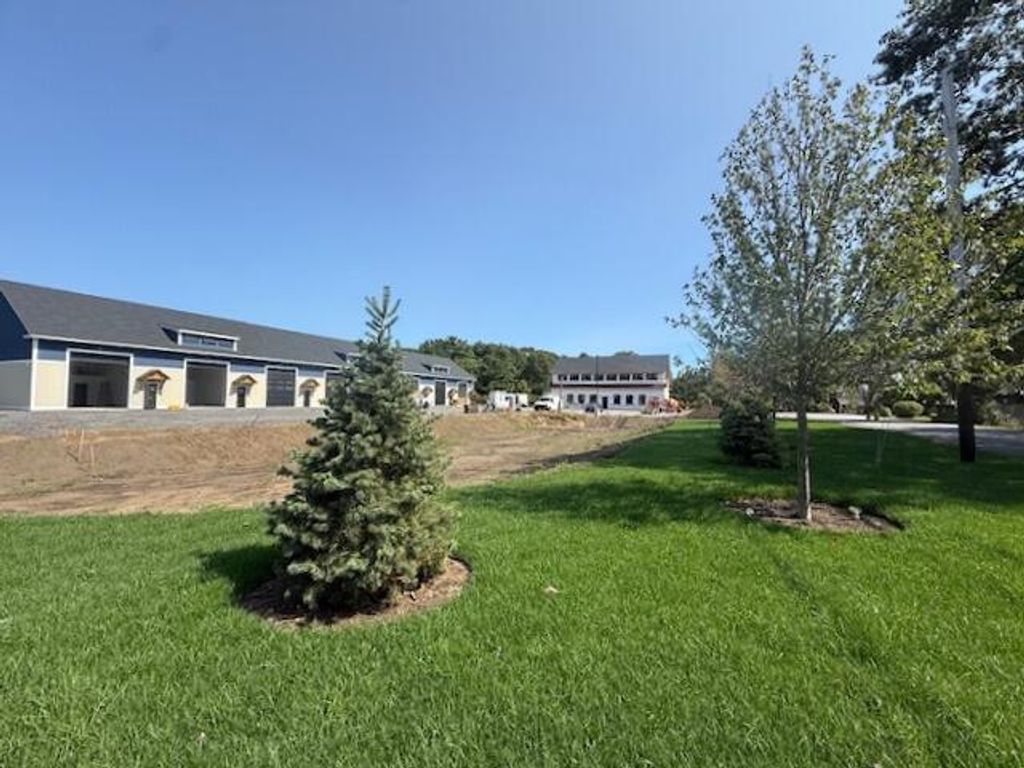 Photo of 22 Laudholm Farm Road #1-10, Wells, ME 04090 (MLS # 1637671)