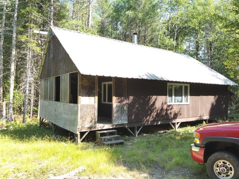 Photo of 279 East Branch Road, Seboeis Plt, ME 04448 (MLS # 1635941)
