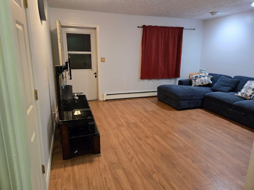 Photo of 27 Mitchell Street, Lewiston, ME 04240 (MLS # 1643240)