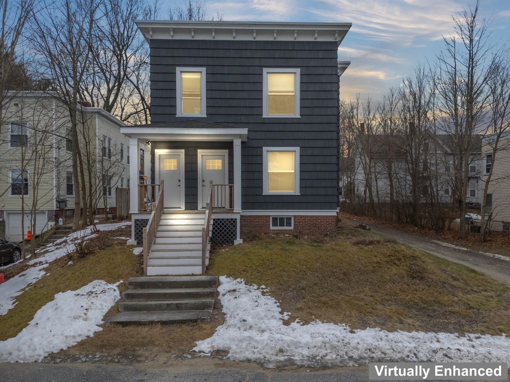 Photo of 31 Burbank Street, Lewiston, ME 04240 (MLS # 1649703)