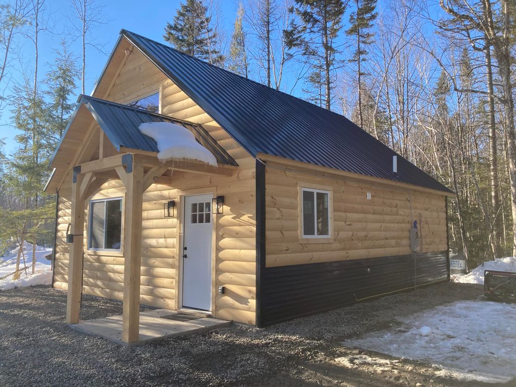 Photo of 8 Jaquith Pond Road, Brownville, ME 04414 (MLS # 1652813)