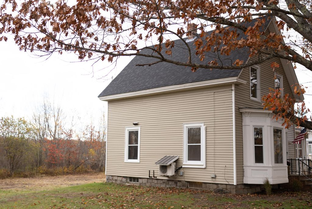 Photo of 1069 Main Road, Milford, ME 04461 (MLS # 1642028)