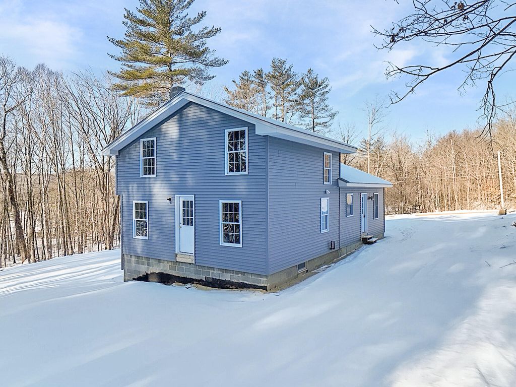 Photo of 21 Coolidge Road, Dixfield, ME 04224 (MLS # 1633140)