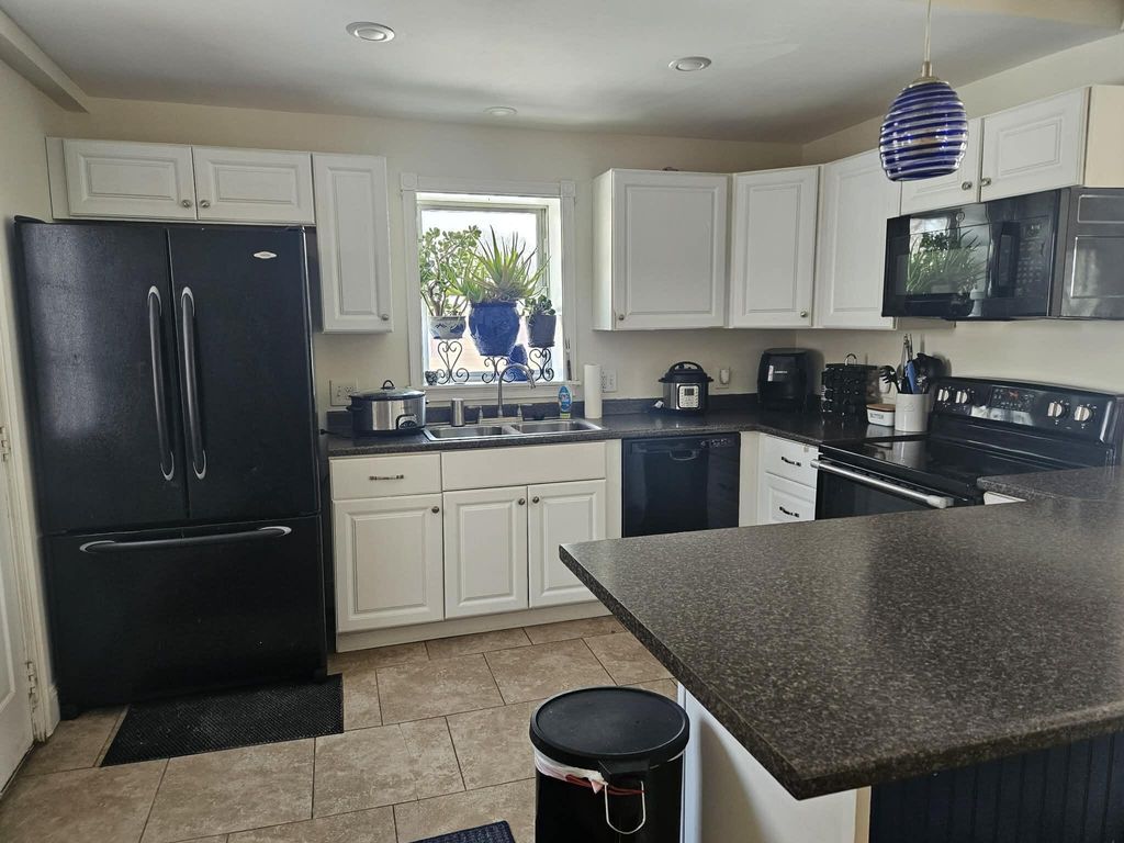 Photo of 18 King Avenue, Lewiston, ME 04240 (MLS # 1651438)