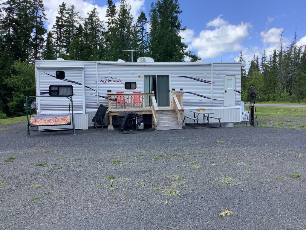 Photo of 3563 Caribou Road, Cross Lake Twp, ME 04779 (MLS # 1598447)