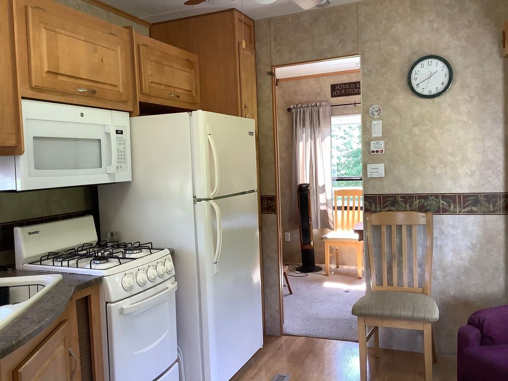 Photo of 3563 Caribou Road, Cross Lake Twp, ME 04779 (MLS # 1598447)