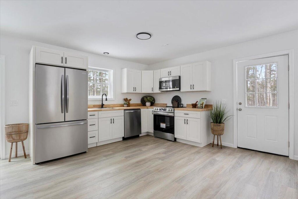 Photo of 7 Strickland Lane, Arundel, ME 04046 (MLS # 1613577)