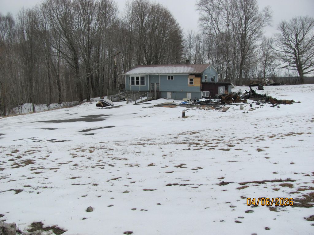 Photo of 200 Clark Road, Patten, ME 04765 (MLS # 1656872)