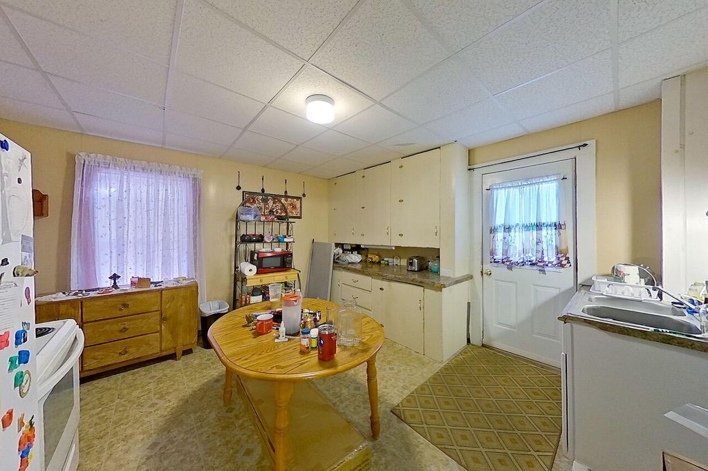 Photo of 27 Vine Street, Livermore Falls, ME 04254 (MLS # 1657940)