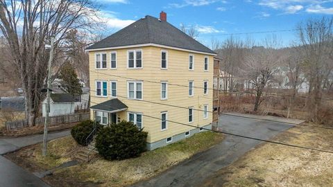 Photo of 27 Vine Street, Livermore Falls, ME 04254 (MLS # 1657940)