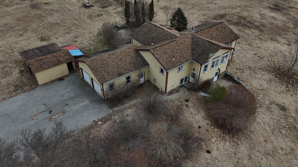 Photo of 128 Pinewoods Road, Lewiston, ME 04240 (MLS # 1657261)