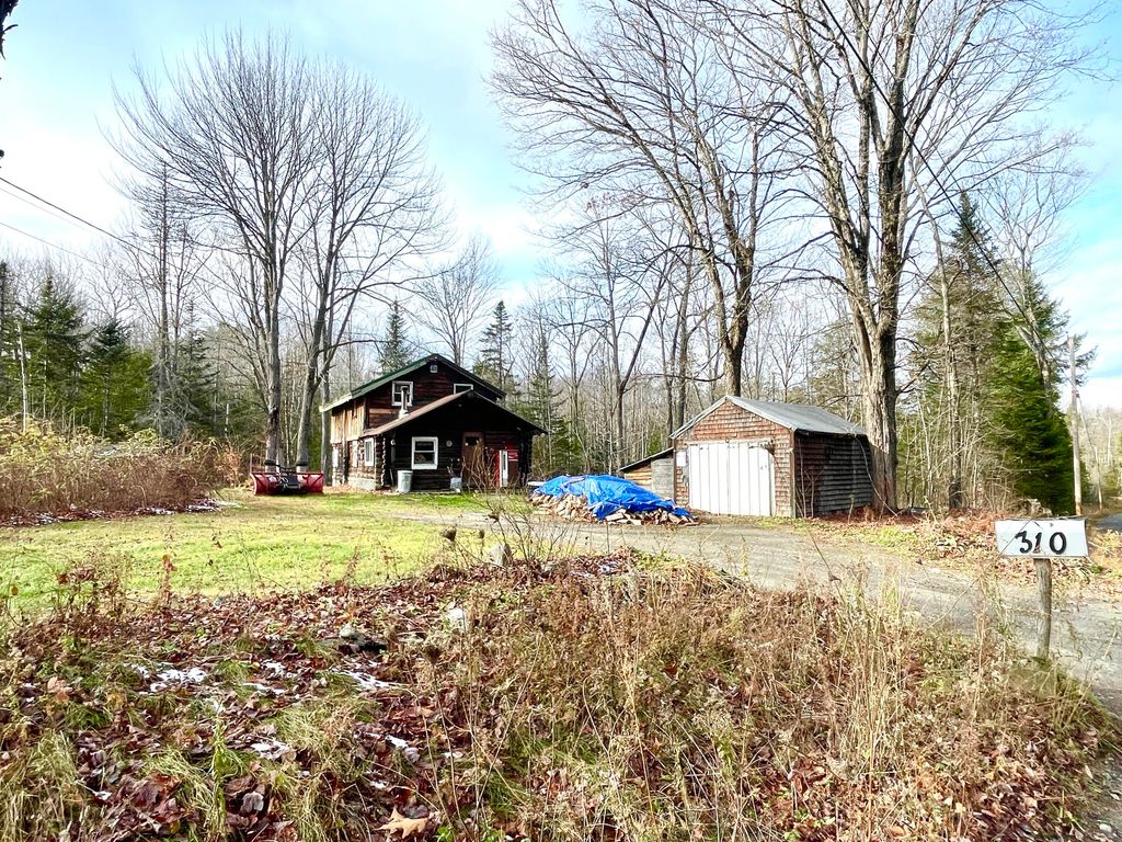 Photo of 310 Sebec Shore Road, Guilford, ME 04443 (MLS # 1643354)