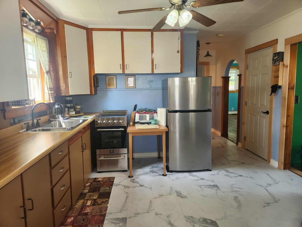 Photo of 34 Cedar Street, East Millinocket, ME 04430 (MLS # 1655738)