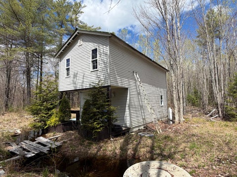 Photo of 1163 Seboeis Road, Seboeis Plt, ME 04448 (MLS # 1661734)