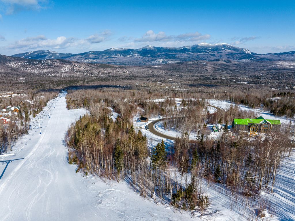 Photo of 8116 Sawtooth Road, Carrabassett Valley, ME 04947 (MLS # 1640375)