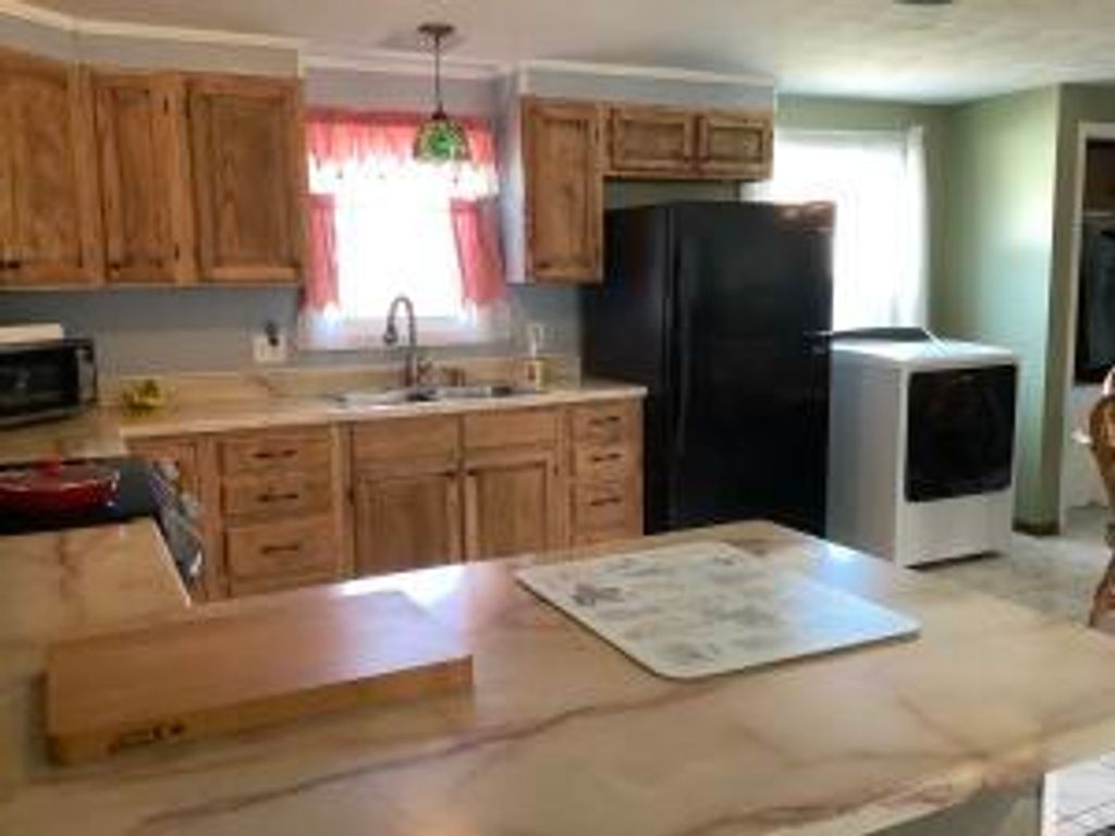 Photo of 127 Madawaska Road, Caribou, ME 04736 (MLS # 1656295)