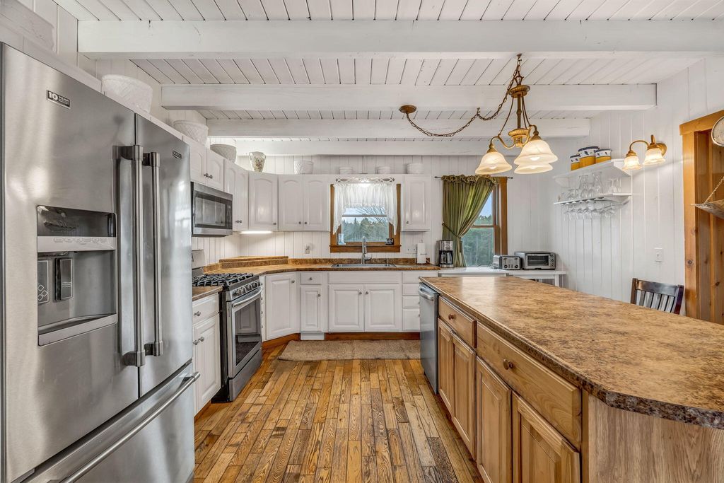 Photo of 54 Folsom Ridge Road, Burlington, ME 04417 (MLS # 1657588)