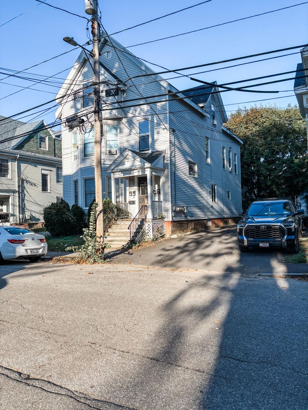 Photo of 56 Wood Street, Lewiston, ME 04240 (MLS # 1660206)