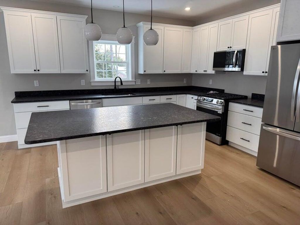 Photo of 22 Lantern Way #23, Auburn, ME 04210 (MLS # 1636383)