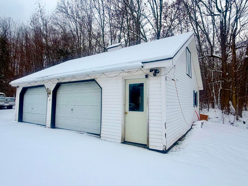Photo of 14 Pinkham Street, Lincoln, ME 04457 (MLS # 1645323)