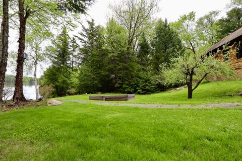 Photo of 567 Big Moose Pt Road, Big Moose Twp, ME 04442 (MLS # 1663846)