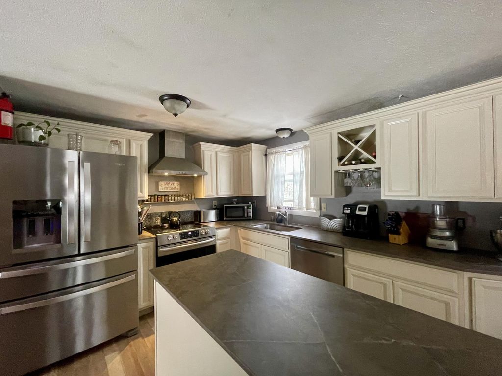 Photo of 12 Irene Street, Lisbon, ME 04250 (MLS # 1581525)