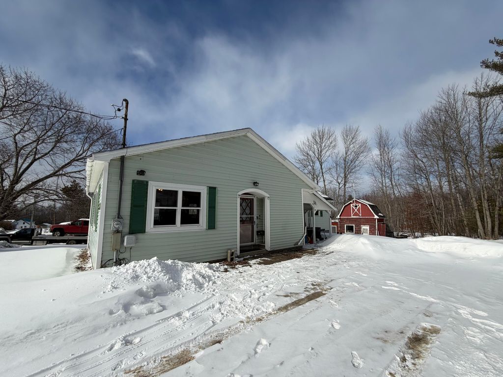 Photo of 19 Pinkham Street, Lincoln, ME 04457 (MLS # 1652783)