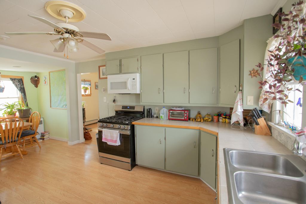 Photo of 5 Front Street, Brownville, ME 04414 (MLS # 1657414)