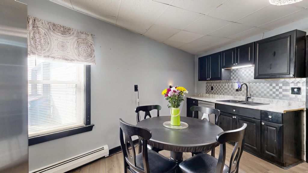 Photo of 26 Holland Street, Lewiston, ME 04240 (MLS # 1658009)