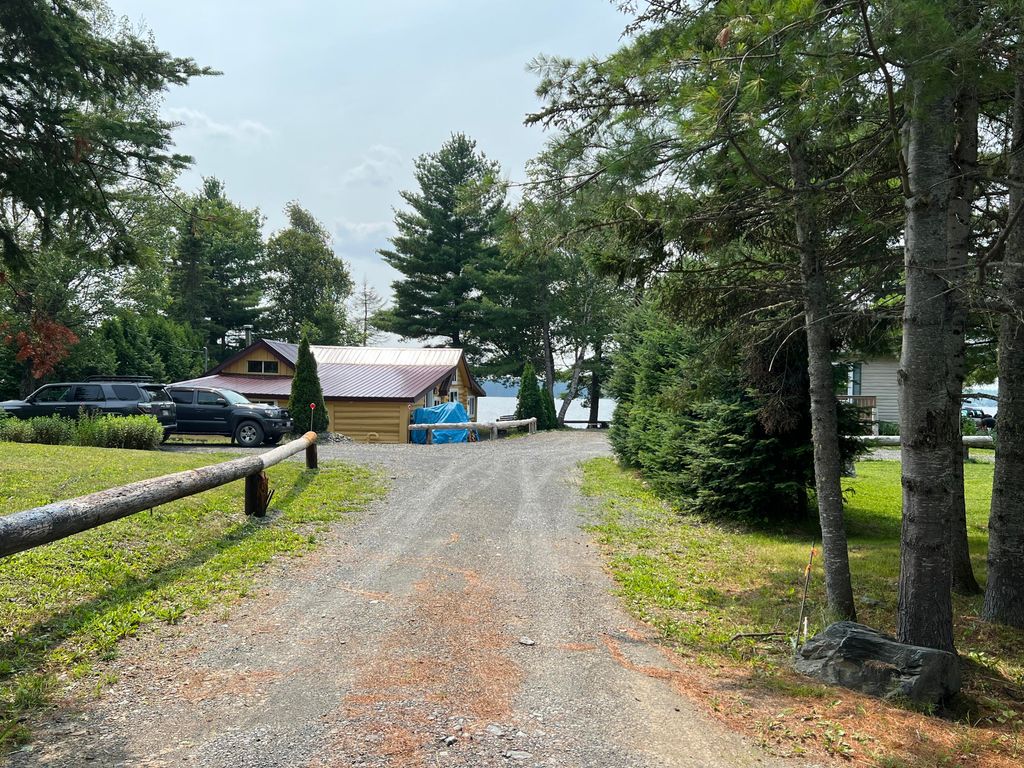 Photo of 86&amp;88 Austin Road, Cross Lake Twp, ME 04779 (MLS # 1632252)