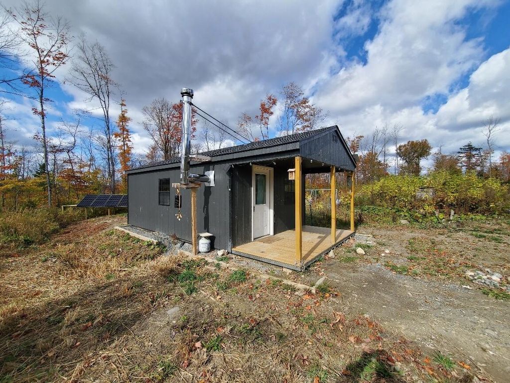 Photo of 91 Greenleaf Brook Road, Amity, ME 04730 (MLS # 1640564)