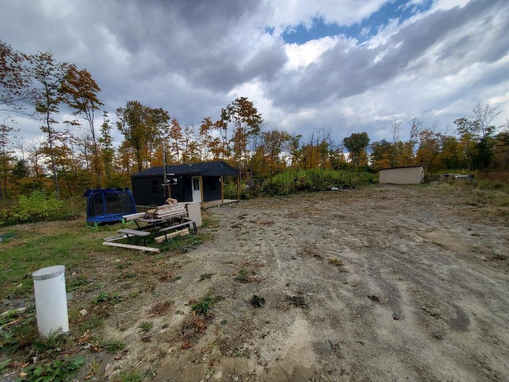 Photo of 91 Greenleaf Brook Road, Amity, ME 04730 (MLS # 1640564)