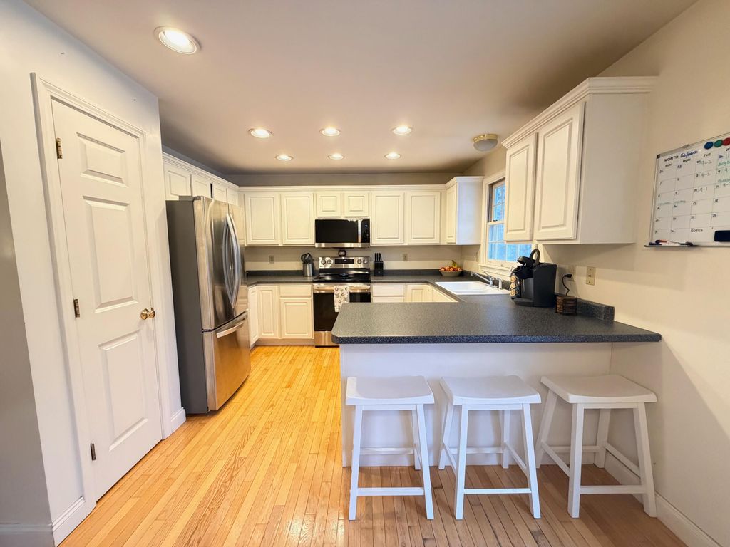 Photo of 99 Deep Cove Road, Raymond, ME 04071 (MLS # 1654423)