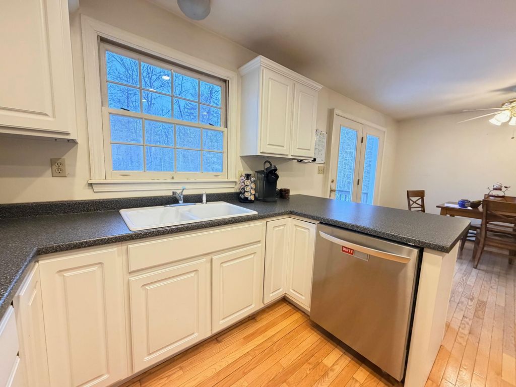 Photo of 99 Deep Cove Road, Raymond, ME 04071 (MLS # 1654423)