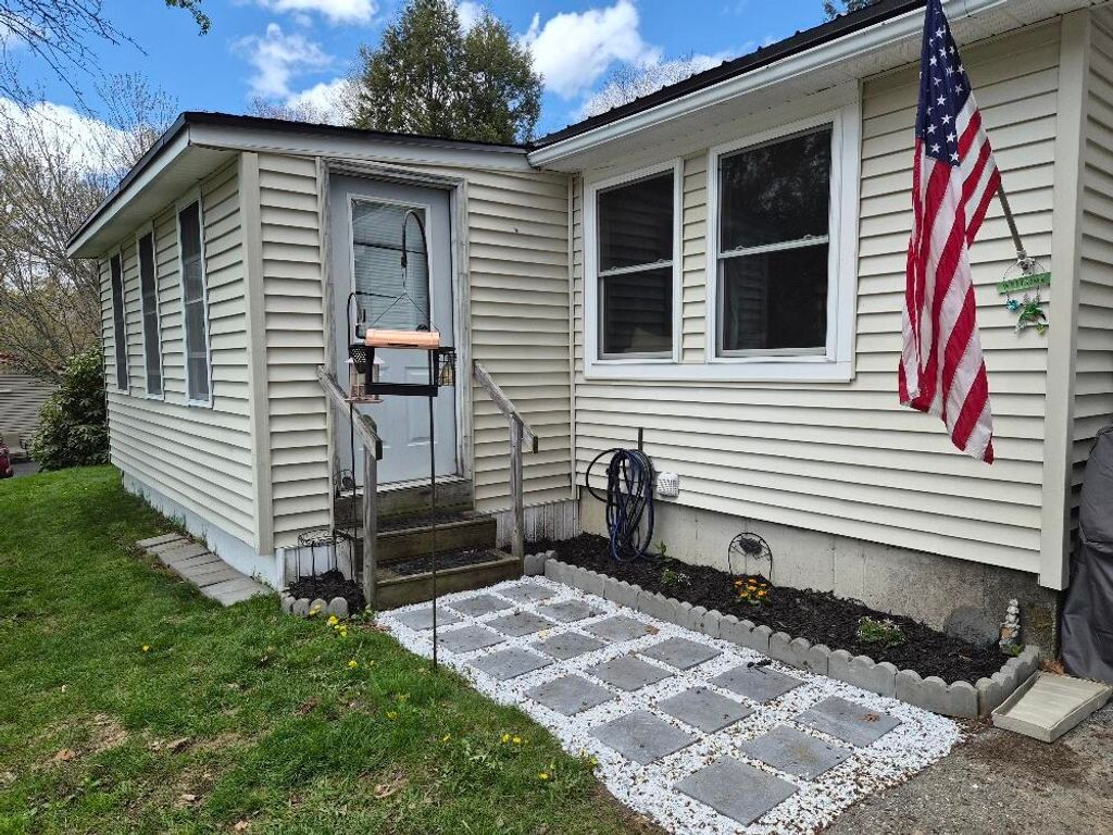 Photo of 22 Ludden Drive, Jay, ME 04239 (MLS # 1655317)