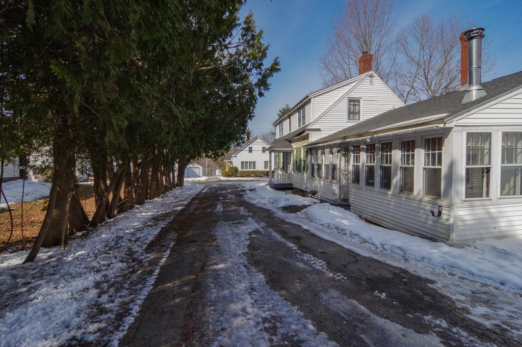 Photo of 61 Pleasant Street, Dexter, ME 04930 (MLS # 1654345)