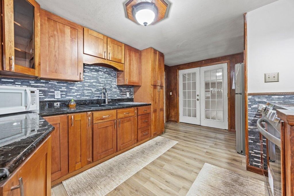 Photo of 11 Cassell Street, Lewiston, ME 04240 (MLS # 1636911)