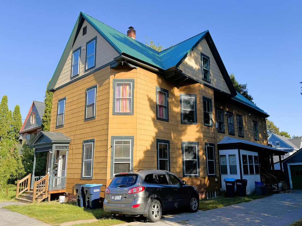 Photo of 62 Dennison Street, Auburn, ME 04210 (MLS # 1681635)
