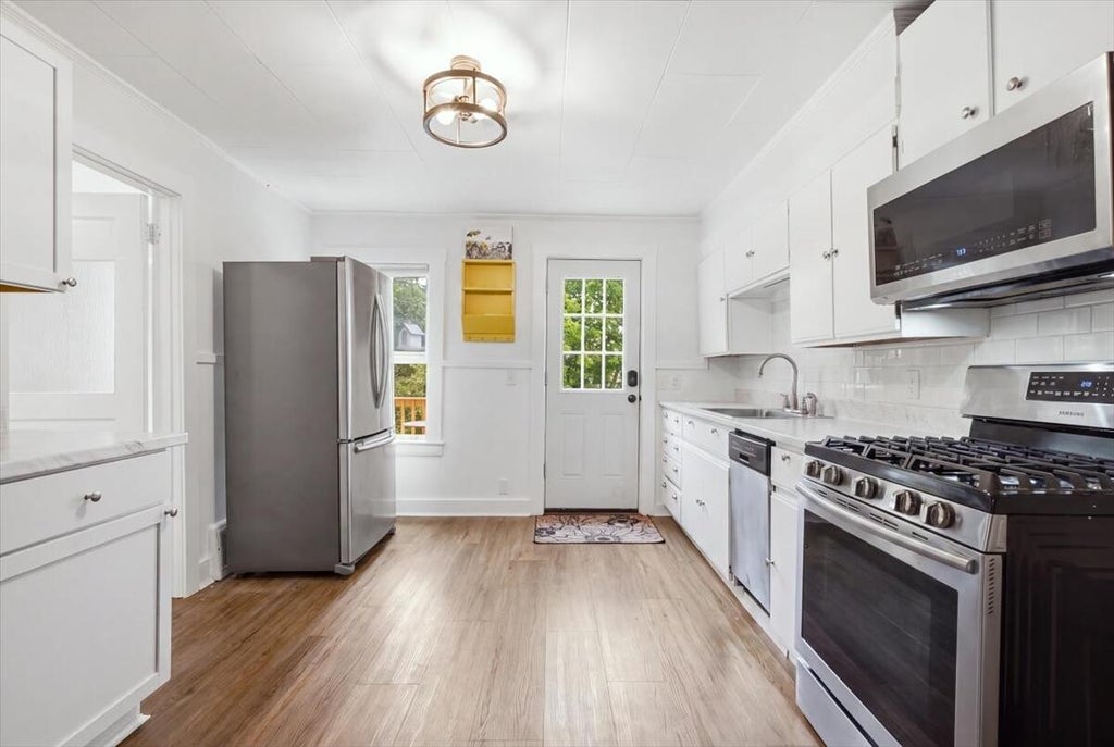 Photo of 36 Winter Street, Lewiston, ME 04240 (MLS # 1680266)